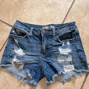 Distressed denim shorts